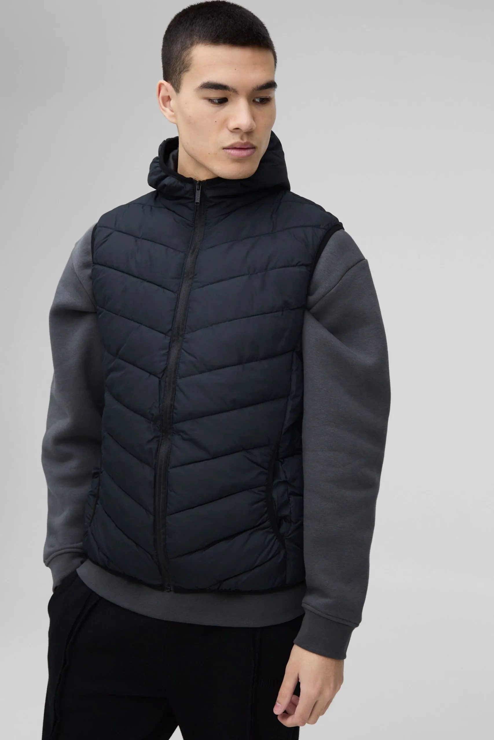 Quilted Zip Through Hooded Gilet In Black