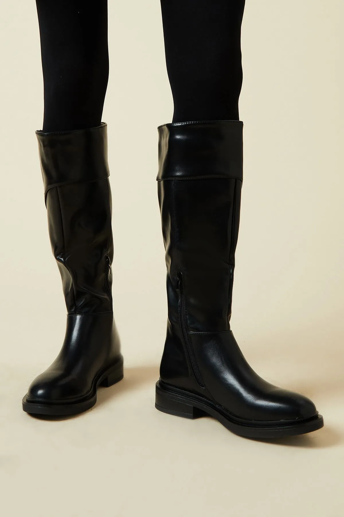 Good For The Sole: Onyx Trim Detail Low Heel Riding Boot
