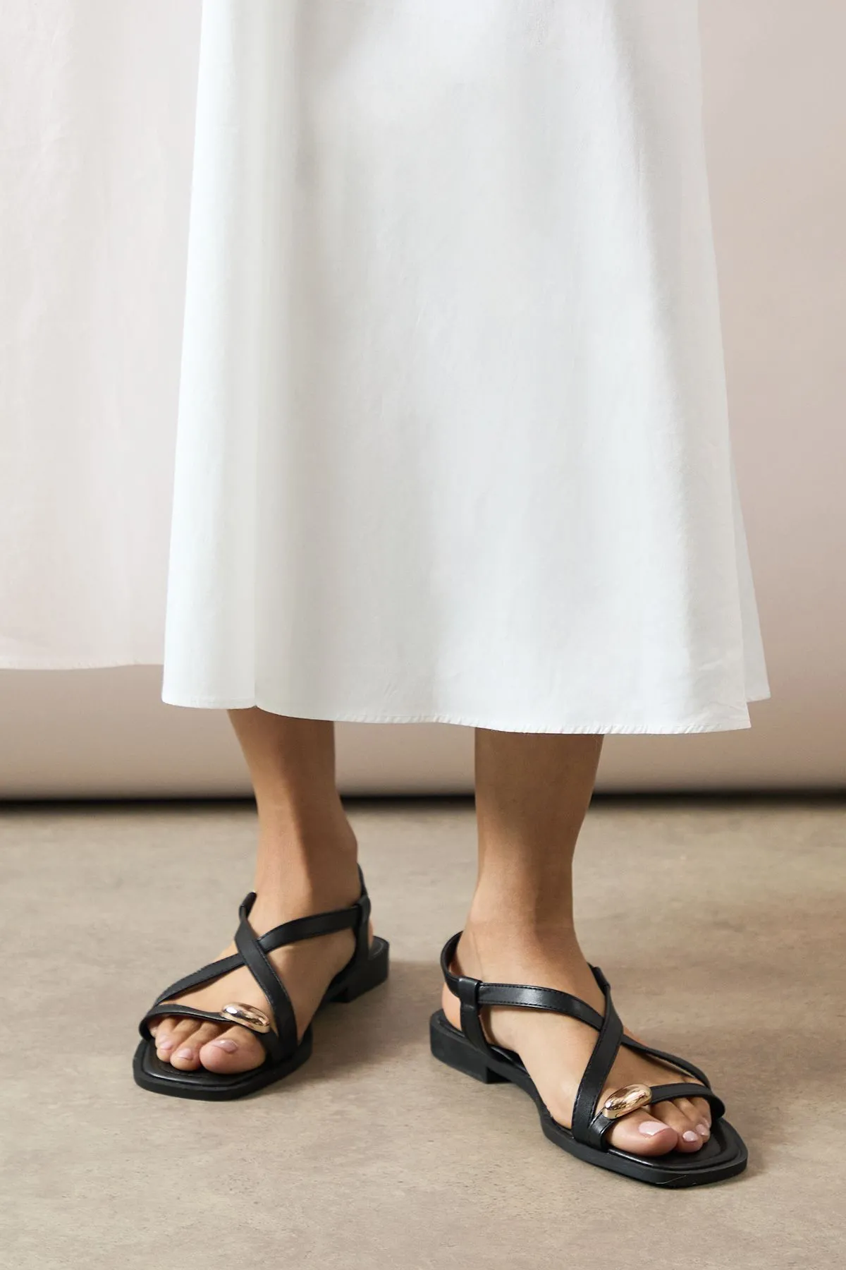 Angela Faux Leather Metal Trim Detail Cross Strap Flat Sandals