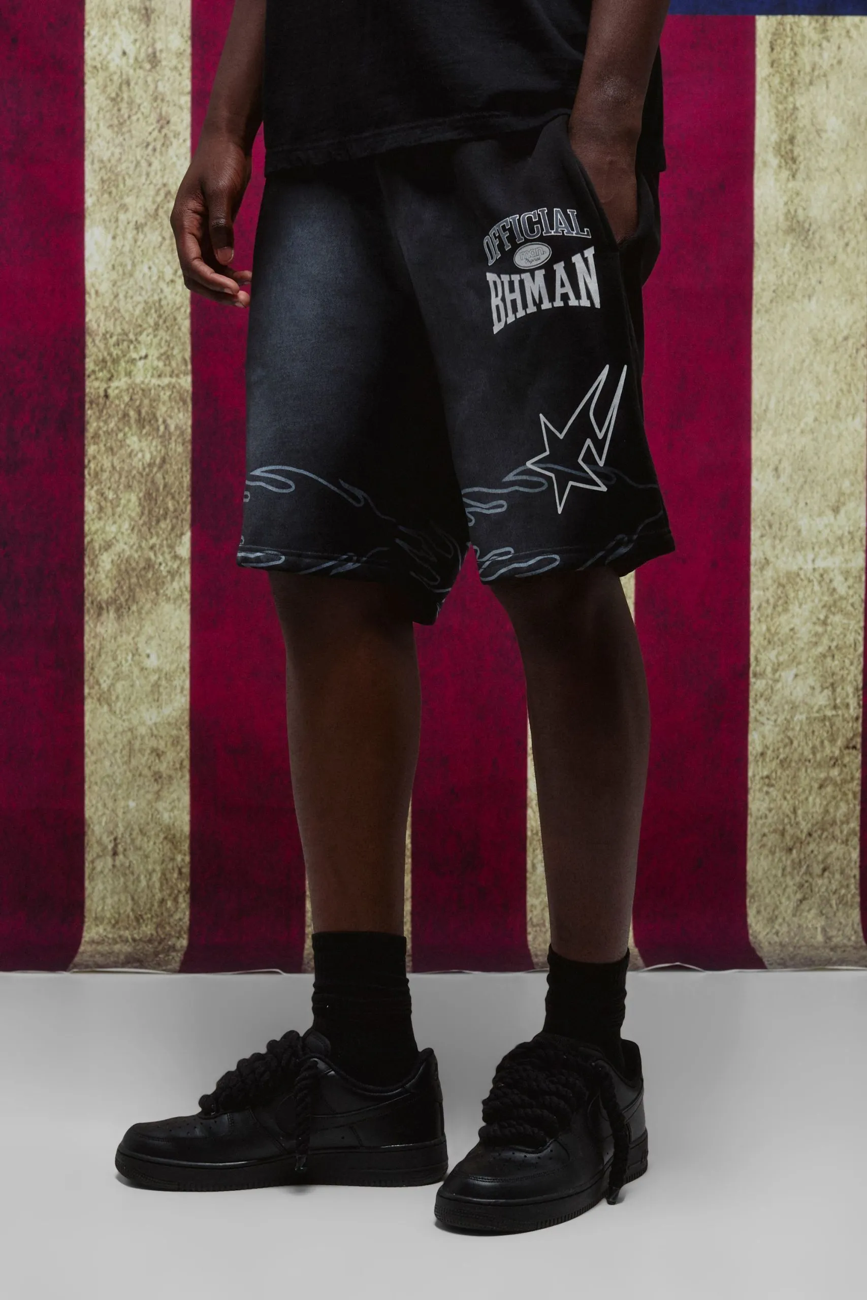 Black Relaxed Mid Length Spray Washed Star Shorts