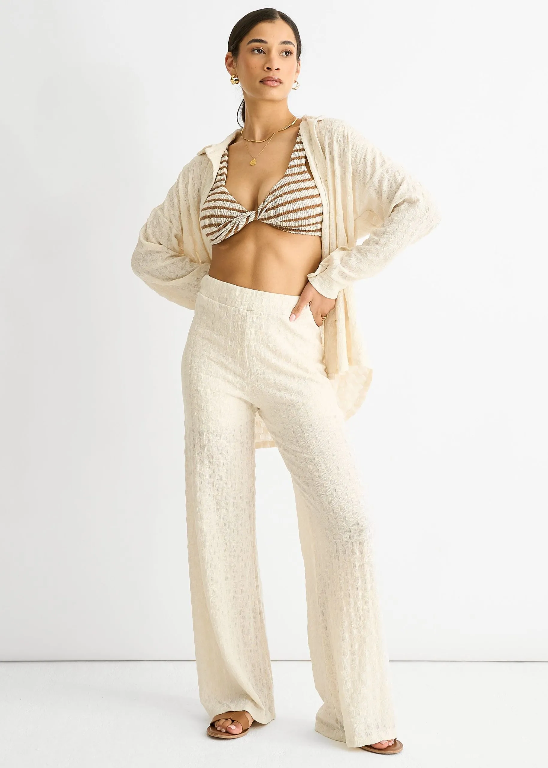 Beige Textured Elasticated Waist Flared Trousers