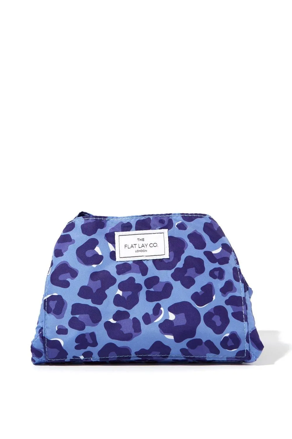 The Flat Lay Co. Drawstring Makeup Bag in Blue Leopard